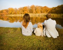 children sat with parents by the river for the artcile Arbitration in family law – a private judge to settle disputes about your.