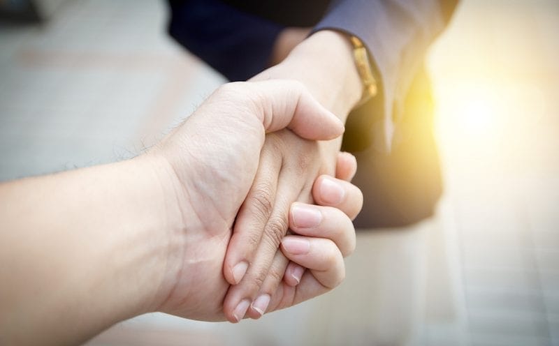 couple holding hands